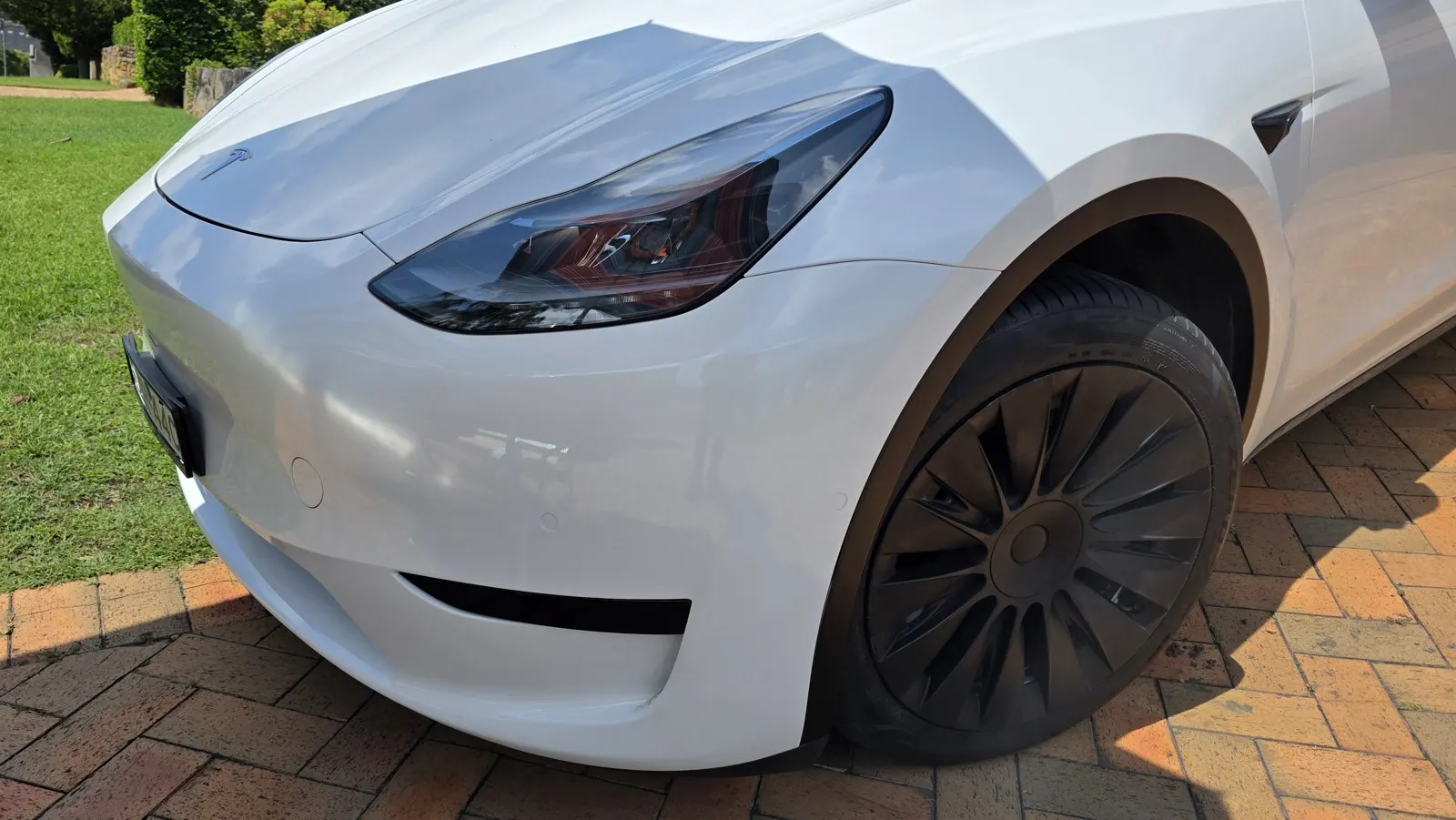 White electric car paint scuffs after repair
