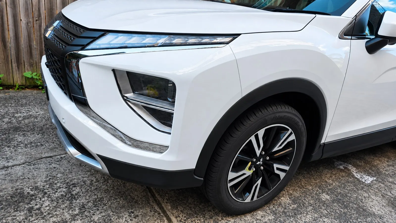 White SUV bumper repair after repair